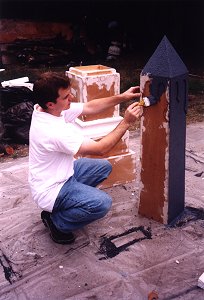 Nathan paints the obelisk