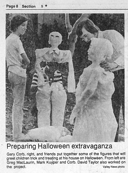 Valley News photo of Greg MacLaurin, Mark Kuyper and Gary Corb putting together figures